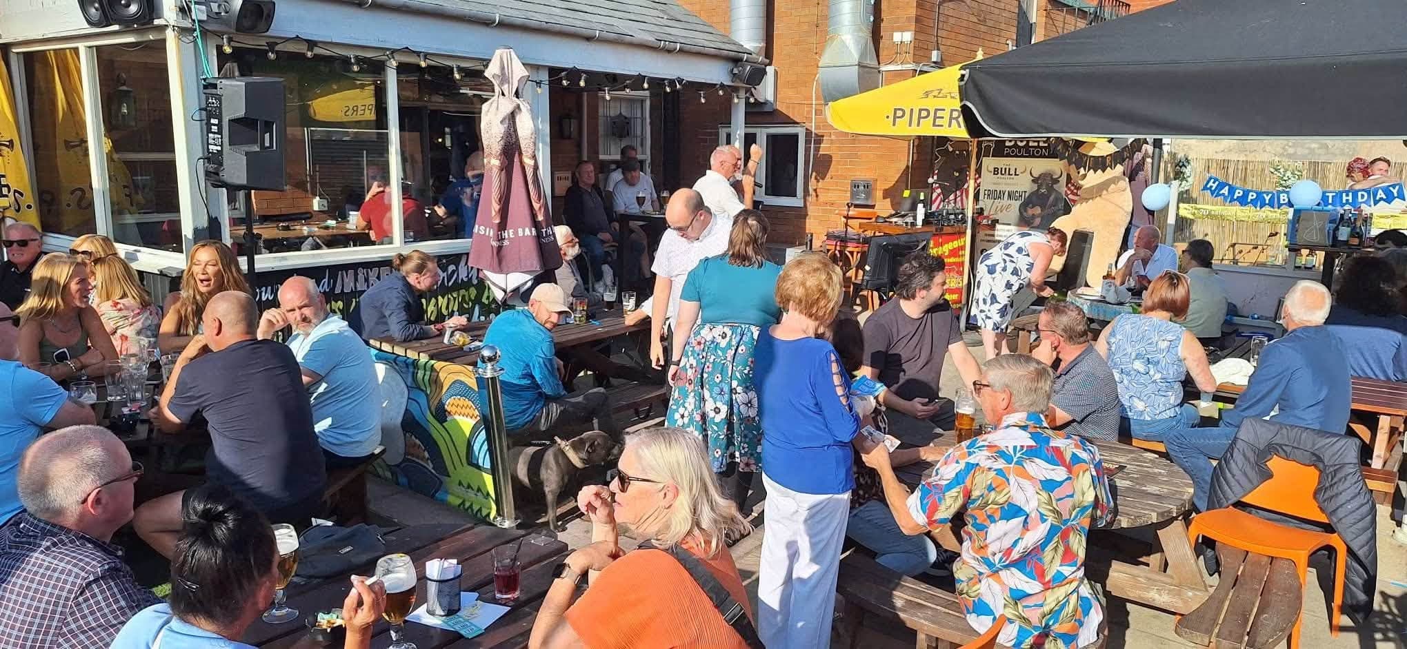 A busy beer garden at The Bull in Poulton during the fundraiser.
